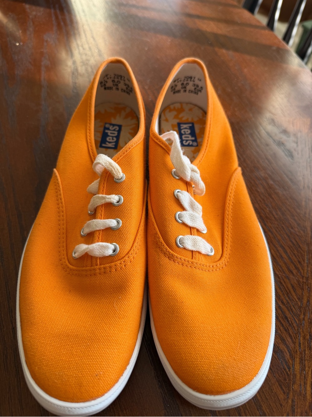 Keds Men's Canvas Sneakers in Bright Orange with White Laces
